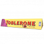 Швейцарський молочний шоколад ТМ "Toblerone" (з родзинками та горіхом) 100г