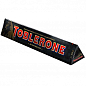Швейцарський чорний шоколад ТМ "Toblerone" (з мигдалем та медом) 100г